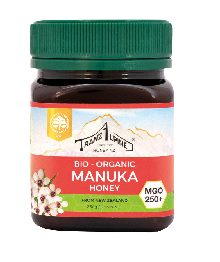 Tranzalpine Bio-Manukahonig MGO 250+ The all-round original beekeeping from New Zealand The valuable honey of the Manuka shrub (Leptospermum Scoparium), related to the Australian tea tree, is used not only as a luxury food in New Zealand, but also traditionally externally and internally. The so-called methylglyoxal (MGO), which is contained in this organic manukahonig with min. 250 mg/kg, is primarily responsible for the unique quality of special manuka londers.
