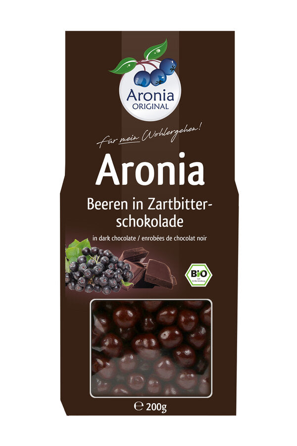 Dried organic aronia berries in a delicately melting delicately melting delicacies sweeten the morning and are a good snack on the couch in the evening. Our gently dried organic aronia berries are lovingly covered with high -quality organic tender bittersomen chocolate.