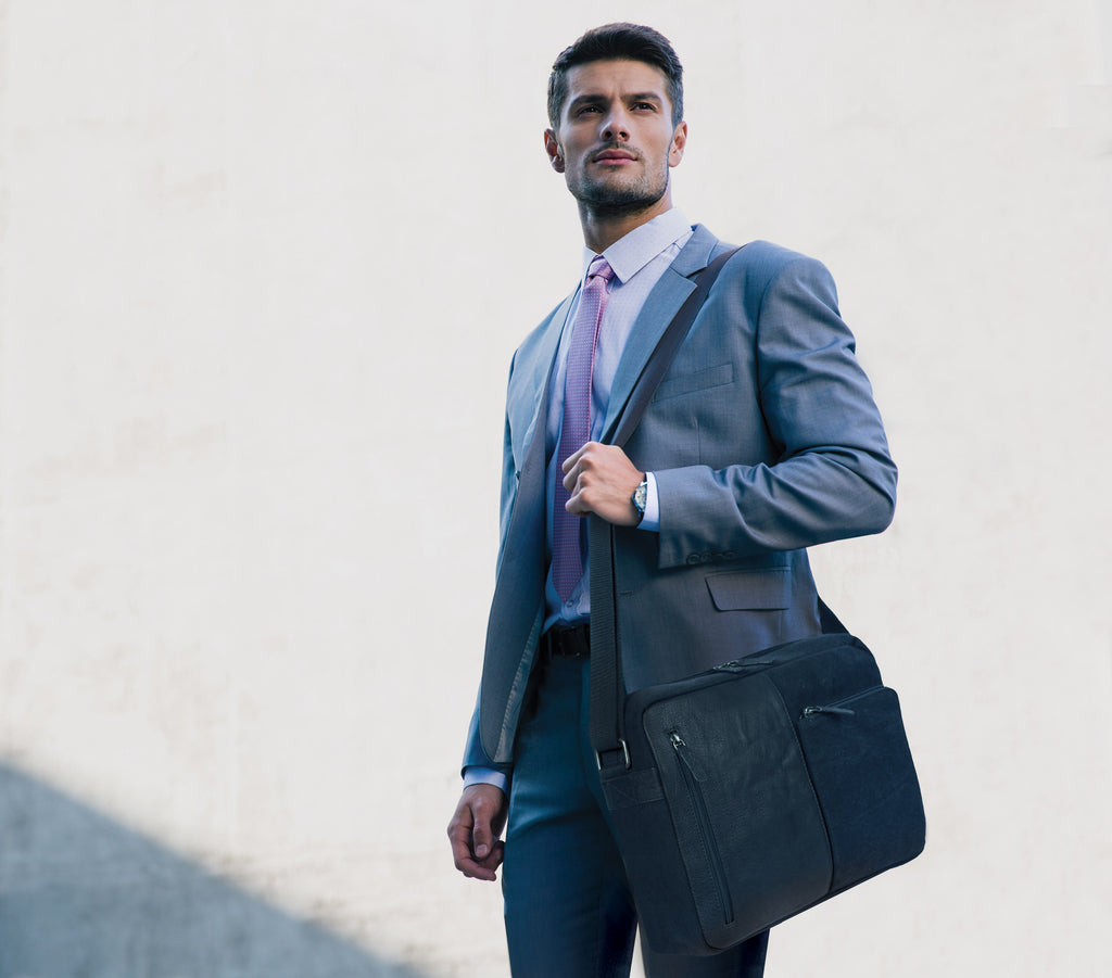 The Stylish Traveler's Companion: Canvas and Leather Messenger Bag